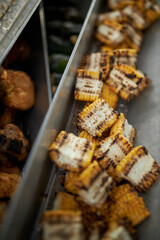 Corn cooked on the grill. Grilled vegetables 