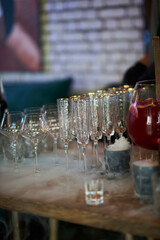 Empty clean glasses for champagne, wine. Glasses are on the table in the restaurant