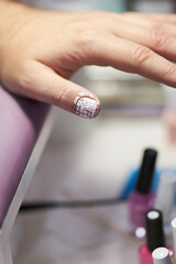 manicurist makes a manicure. The process of creating a quality manicure. Personal care. Beauty industry 
