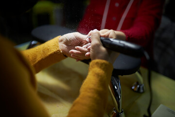 manicurist makes a manicure. The process of creating a quality manicure. Personal care. Beauty industry 
