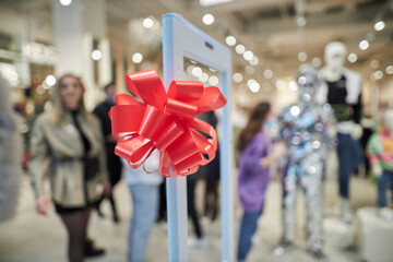 Red ribbon at the opening of the store close-up. 