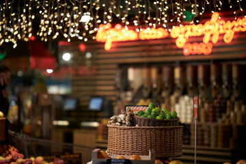 The garland in the supermarket decorates the store. The shop is decorated with lanterns.