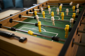 Table soccer. Excitement. Table football close-up.