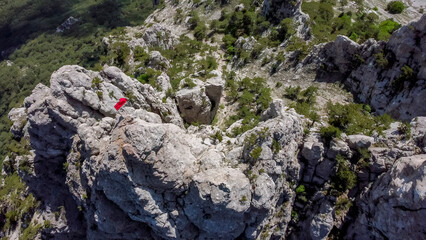  flight over  the peak of ai petri mountain with red flag  in Crimea.