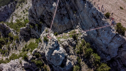  flight over suspension bridges at the peak of ai petri mountain in Crimea.