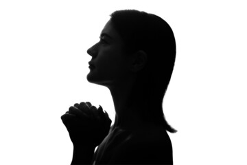 祈る女性の横顔のシルエット