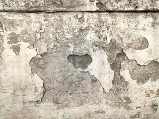 Grey Concrete Texture old wall with peeling paint, scratches and cracks