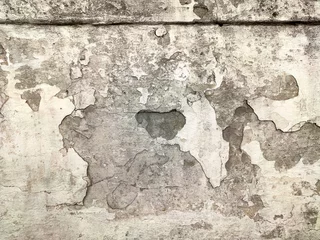 Fotobehang Verweerde muur Grijze betonnen textuur oude muur met afbladderende verf, krassen en scheuren