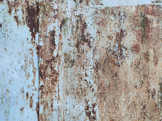 Corroded metal background. Rusty metal background with streaks of rust. Rust stains. Rystycorrosion.
