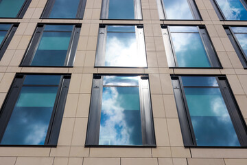 Modern building with tined windows, low angle view