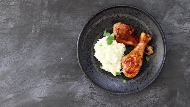 Serving Barbecue Chciken and Mashed Potatoes
