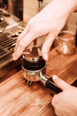 close up of a person holding a coffee filter