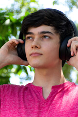 young person listening to music