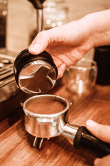 Fototapeta na wymiar hand holding a coffee pot