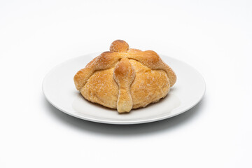 Isolated traditional Mexican bread of the dead also known as 