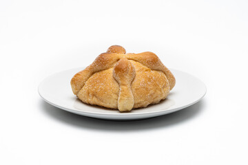 Isolated traditional Mexican bread of the dead also known as 