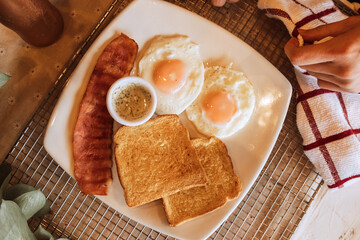 Breakfast with bacon and eggs