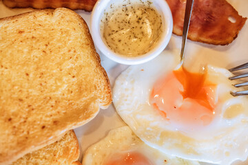 Breakfast with bacon and eggs
