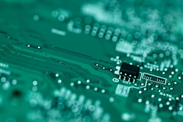 electronic circuit board with processor, soft focus photo
