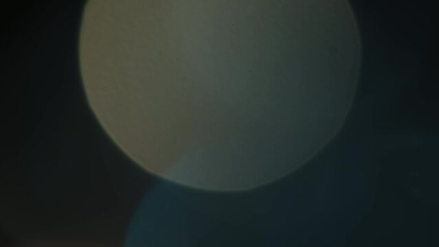 Light Leaks abstract 4K footage. Moving blinking circle lens glow flare bokeh overlays, animation defocused blurred color background. Compositing over your footage, stylizing video, transitions