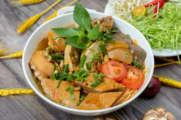 Vietnam traditional street food bun rieu cua crab rice noodle soup bowl