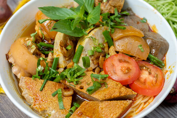 Vietnam traditional street food bun rieu cua crab rice noodle soup bowl