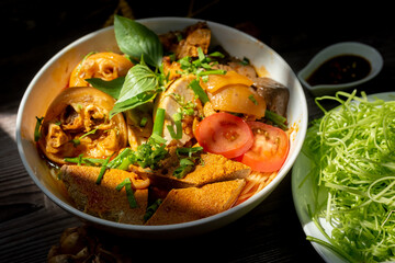 Vietnam traditional street food bun rieu cua crab rice noodle soup bowl