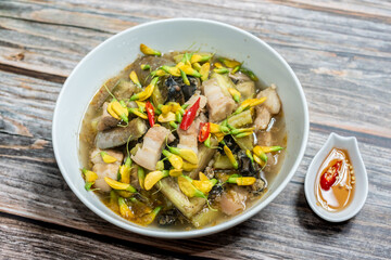 Vietnam traditional street food bun mam vermicelli noodles soup bowl (VIETNAMESE FERMENTED FISH NOODLE SOUP)