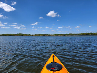 Front of orange kayak on Nine Mile Pond in Everglades National Park, Florida on sunny April afternoon..