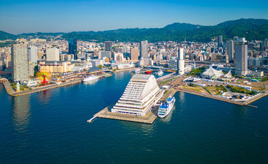 Aerial view of Kobe Port Tower under construction and downtown Sannomiya