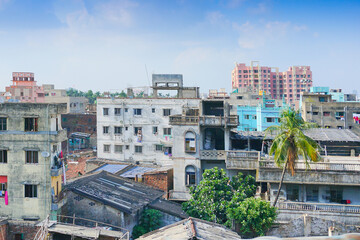 Modern and old architecture of buildings, blue sky and white clouds in background. Kolkata, West Bengal, India.
