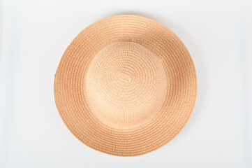 Fototapeta na wymiar Straw hat cap , isolated on a white background