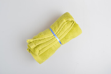 Green towel isolated on a white background