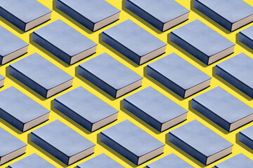 Many blue books on yellow background. Pattern for design