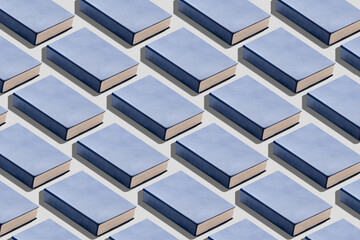 Many blue books on light background. Pattern for design