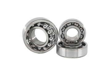 Group of various ball and roller bearings on white