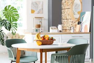 Fruit basket on table in modern dining room