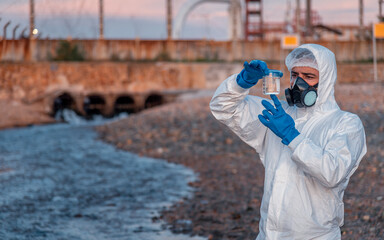 Scientist wearing protective uniform and glove under working water analysis and water quality by...