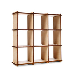 Toy wooden shelving unit on white background