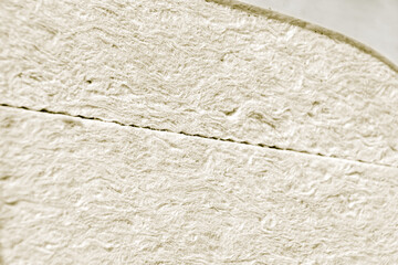 mineral wool or glass wool in white or cream color in package