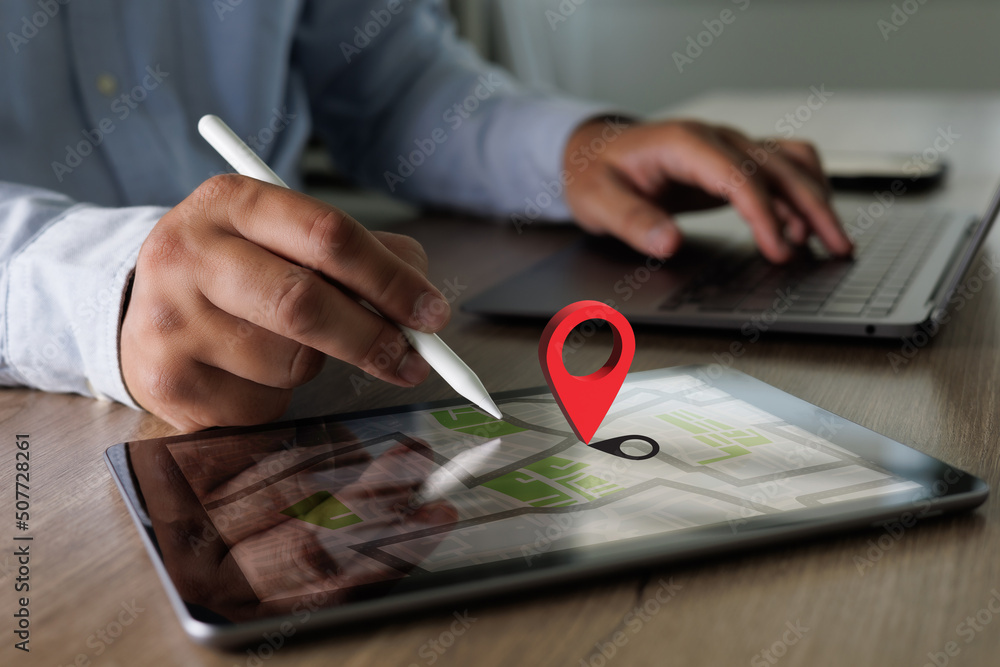 Poster hand using a smartphone holding gps map to route destination network connection location street map 
