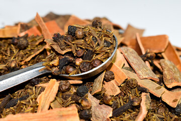 Various spices isolated over white background.