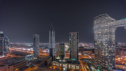 Sky view to skyscrapers and hotels in Dubai downtown aerial timelapse.