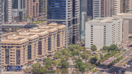 Close up view of Dubai Financial Center district with tall skyscrapers timelapse.