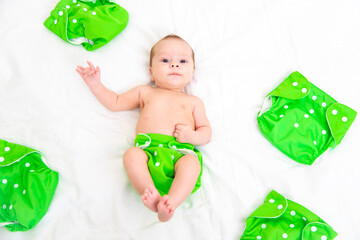 Reusable diaper on the baby copy space . An article about reusable diapers. Saving on diapers....