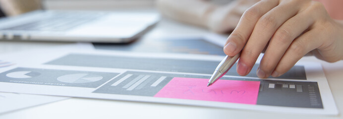 Accounting businesswomen are calculating income-expenditure and analyzing real estate investment data, Dedicated to the progress and growth of the company, Financial and tax systems concept.