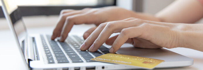 Online product purchase, Businesswoman use laptop register via credit cards to make online purchases, Shopping and mail, credit card online security, Online shopping concept.