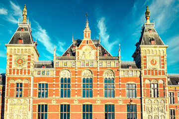 Fototapeta na wymiar Amsterdam Central Station, central station of the Dutch capital. It was built between 1881 and 1889 to a design by P.J.H. Cuypers, A.L. van Gendt and L.J. Eijmer; Amsterdam, Netherlands