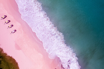 Top view of amazing pastel pink sand beach and turquoise sea copy space available nature background...