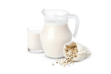 White Job's tears (Adlay millet or pearl millet) and glass of fresh millet milk isolated on white...
